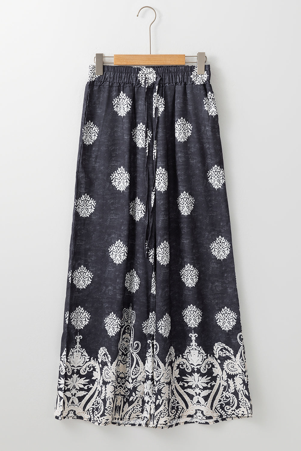 Schwarze Hose mit weitem Bein und Bohemien-Print