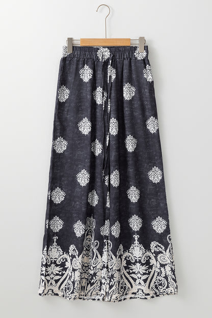Schwarze Hose mit weitem Bein und Bohemien-Print