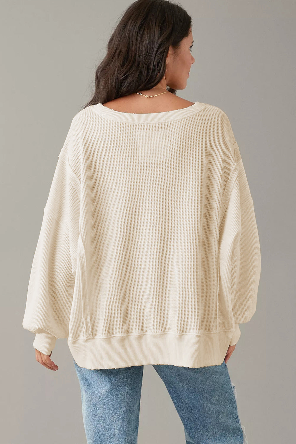 Weißes Oversize-Sweatshirt mit Waffelstrick und Bischofsärmeln
