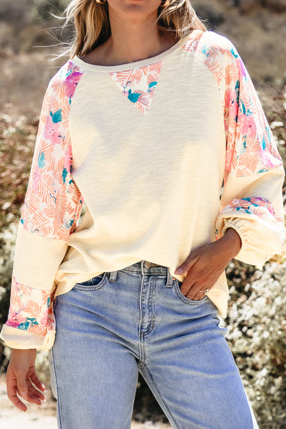 Aprikosenfarbene Bluse mit strukturiertem Patchwork und Ballonärmeln