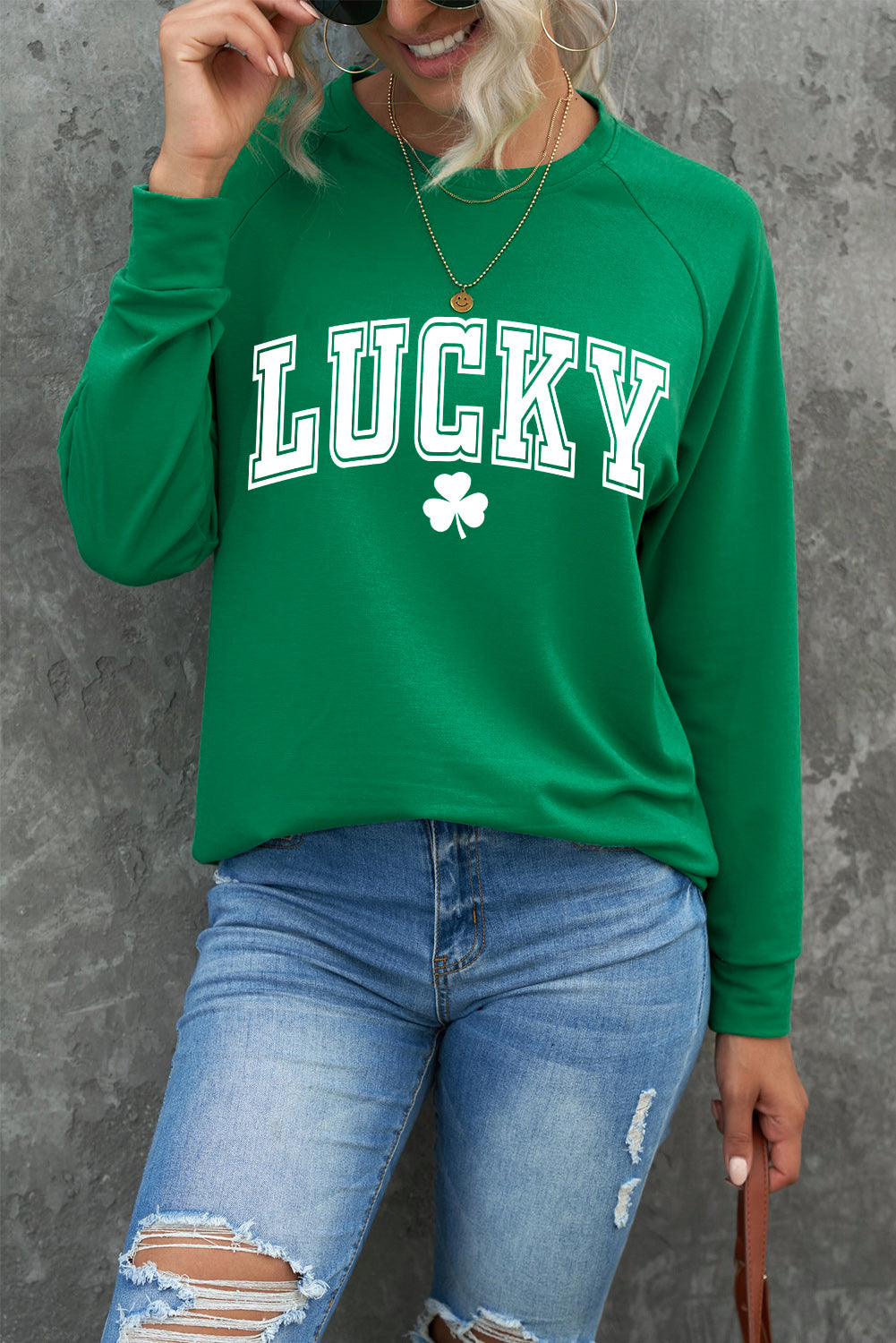 Grünes Sweatshirt mit Raglanärmeln und Glücksklee-Print von St. Patrick's Day