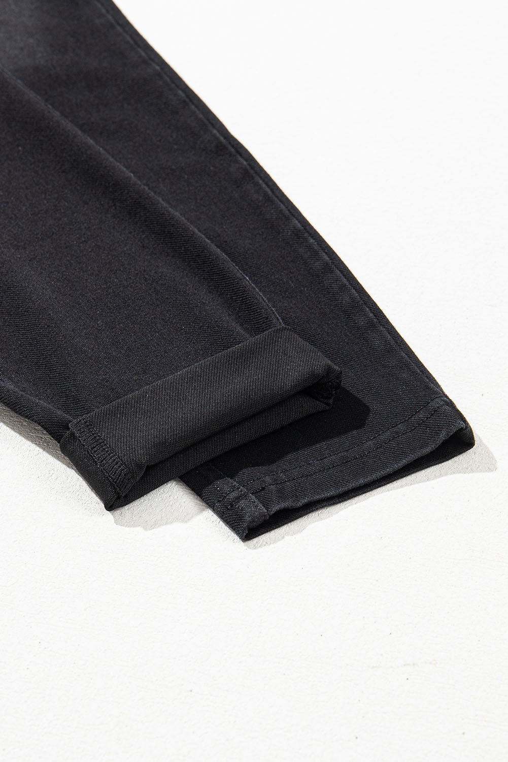 Schwarze, dehnbare Jeggings mit gewölbter Taille und schmaler Passform