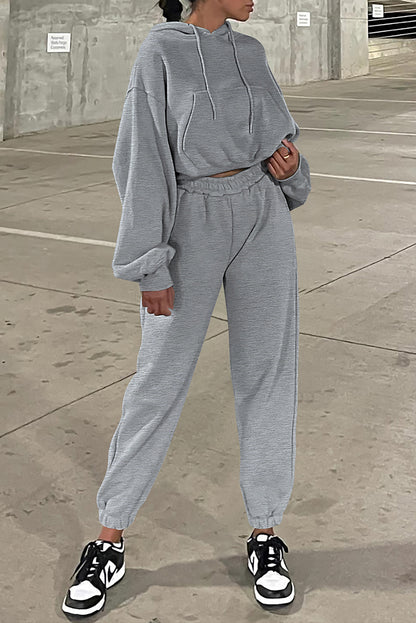 Graues Activewear-Set mit Kapuzenpullover und Jogginghose mit überschnittenen Schultern