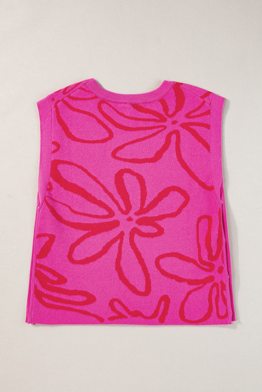 Ärmelloses Stricktop mit Blumenmuster und Knopfleiste in leuchtendem Pink