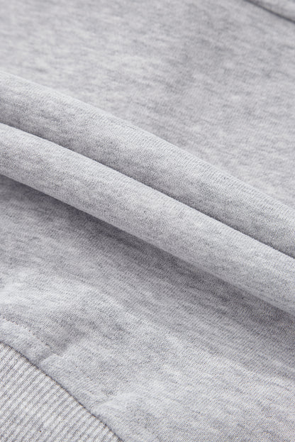 Hellgraues Sweatshirt mit Viertelreißverschluss, Stehkragen und Kängurutasche