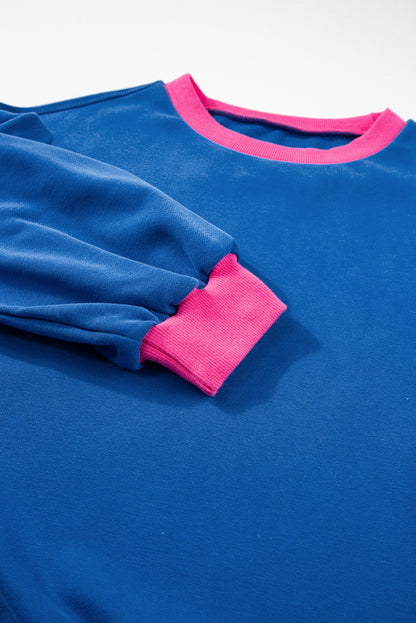Blaues Sweatshirt mit Farbblock-Muster und Puffärmeln