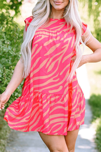 Rosa Kleid mit Zebrastreifen-Print und Rüschenbesatz und Taschen