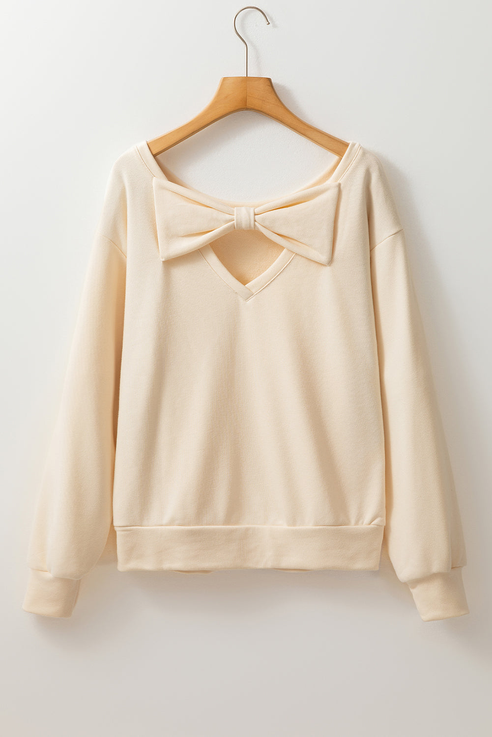Aprikosenfarbenes Sweatshirt mit Rundhalsausschnitt und Schleife