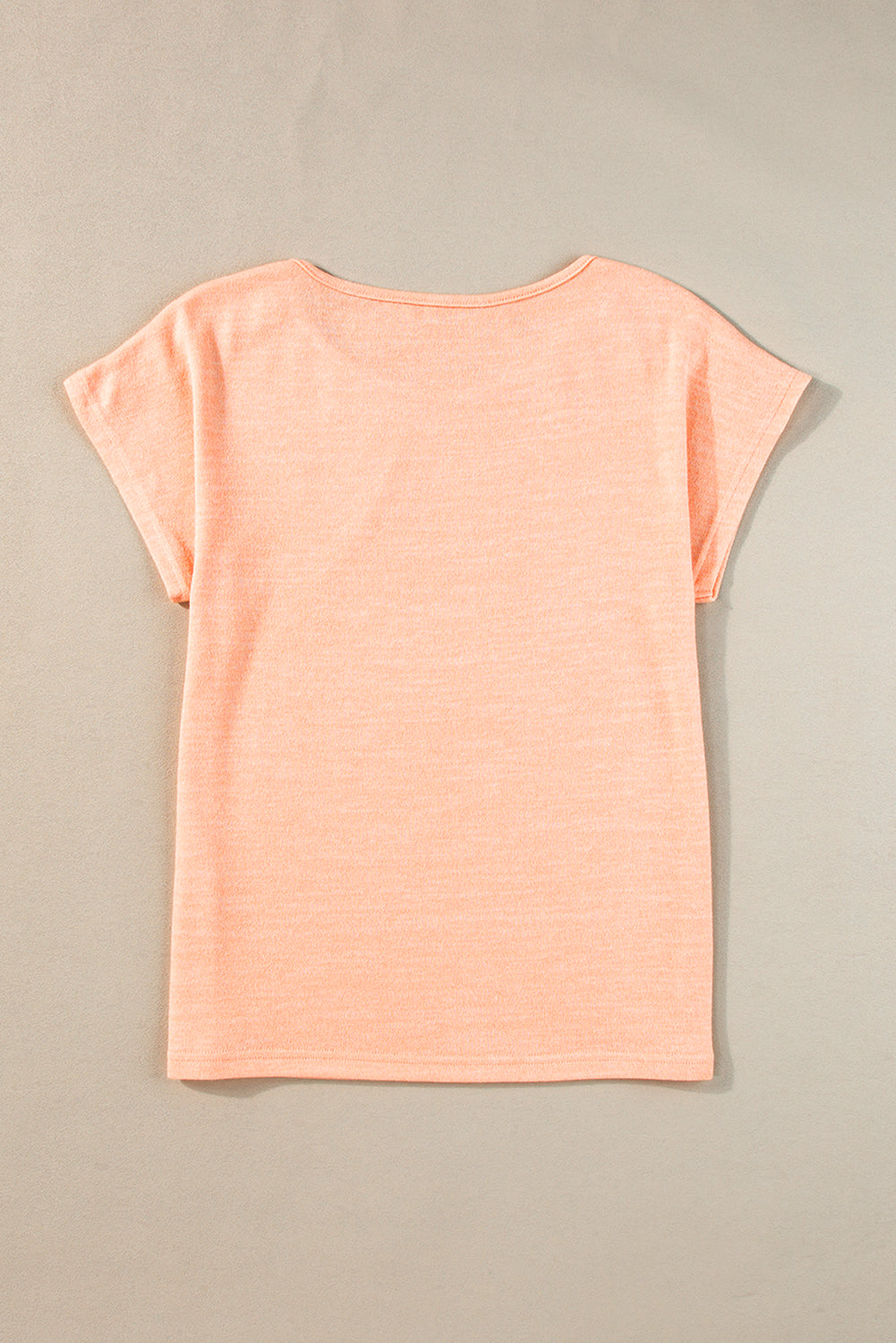 Aprikosenrosa Lässiges T-Shirt mit Fledermausärmeln und Knopfdetail
