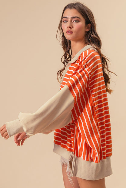 Orangefarbenes Sweatshirt mit Farbblockdesign und lockerer Passform, Kragen und überschnittenen Schultern