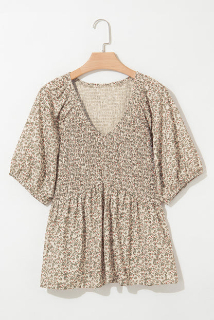Gesmoktes Top mit Blumenmuster und Puffärmeln
