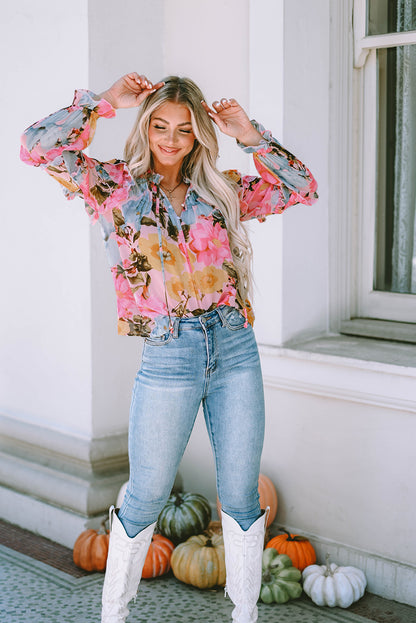 Rosa Bluse mit Blumenmuster und Rüschen
