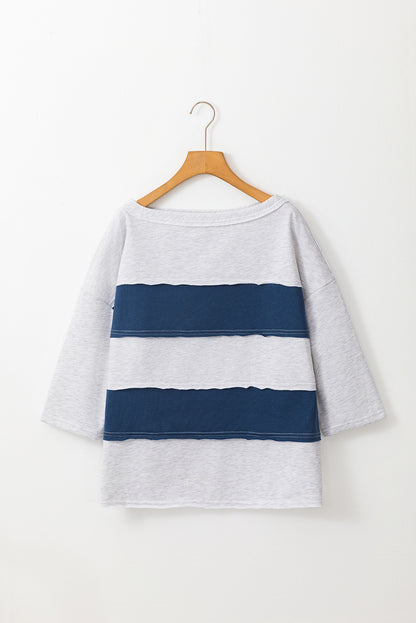 Segelblaues Sweatshirt mit Farbblock-Streifen und Patchwork-Rohnähten