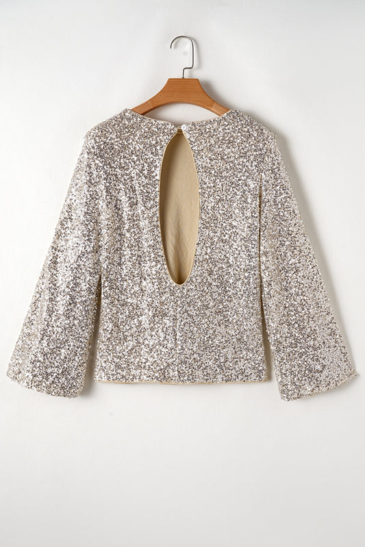 Silberne Bluse mit Pailletten, Puffärmeln und Cut-Out am Rücken