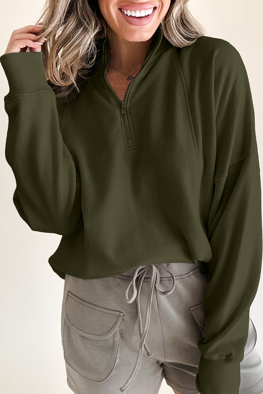 Jungle Green – Pullover mit Reißverschluss am Hals und überschnittenen Schultern