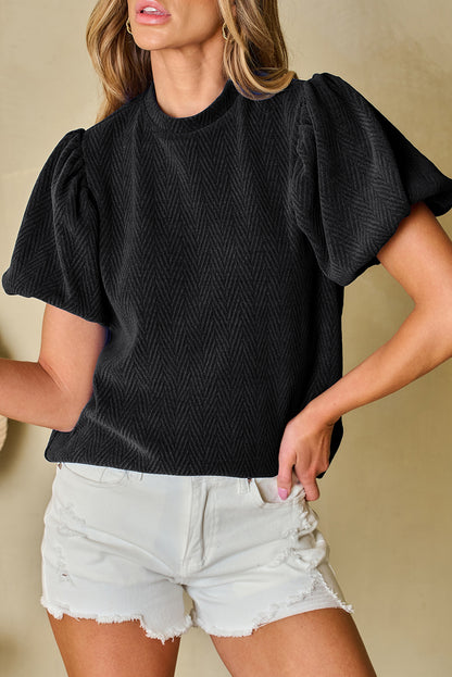 Schwarze Bluse mit Stehkragen und Puffärmeln