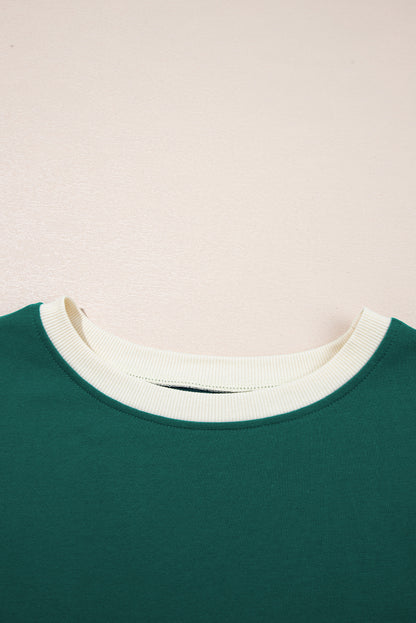 Evergreen 2-teiliges Set mit T-Shirt und Rock mit überschnittener Schulter und Farbblockdesign