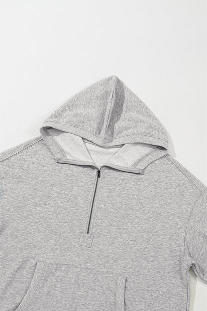 Hellgrauer Oversize-Hoodie mit Kängurutasche und halbem Reißverschluss