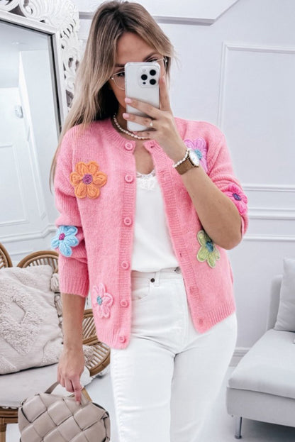 Niedliche Strickjacke mit Blumenmuster in Rosa