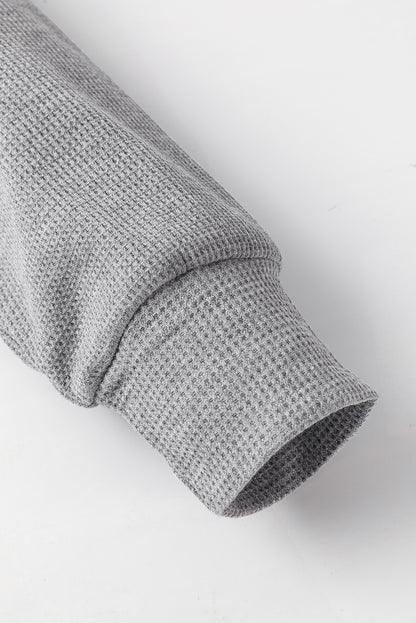 Grauer, übergroßer Kapuzenpullover mit Waffelstrick und Fleecefutter