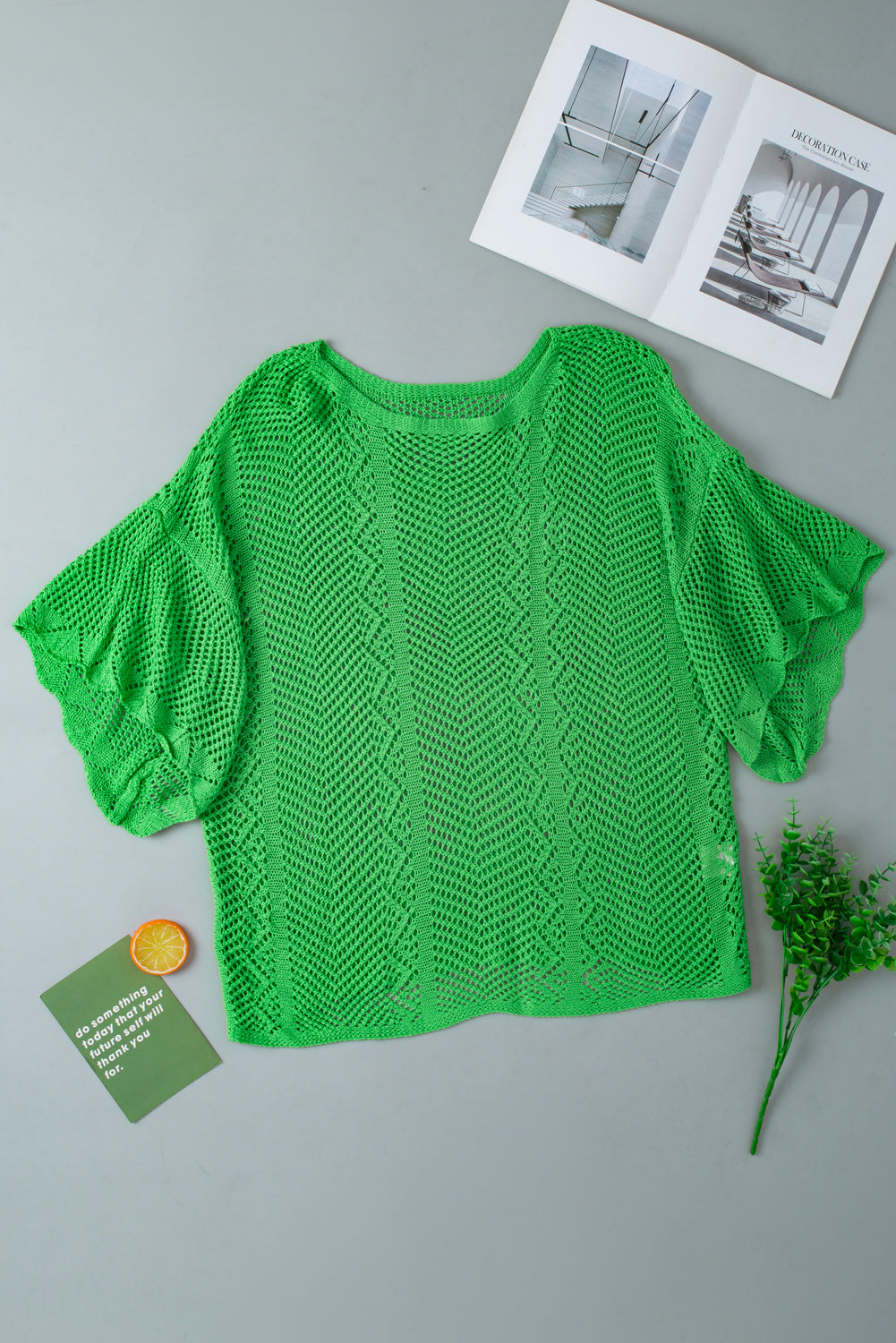 Grünes, kurzärmliges Pointelle-Stricktop mit Muschelsaum