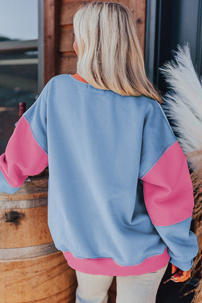 Hellrosa Sweatshirt mit überschnittener Schulter und Patchwork-Farbblock