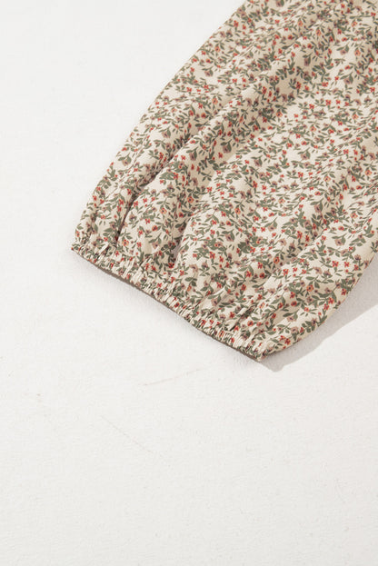 Gesmoktes Top mit Blumenmuster und Puffärmeln
