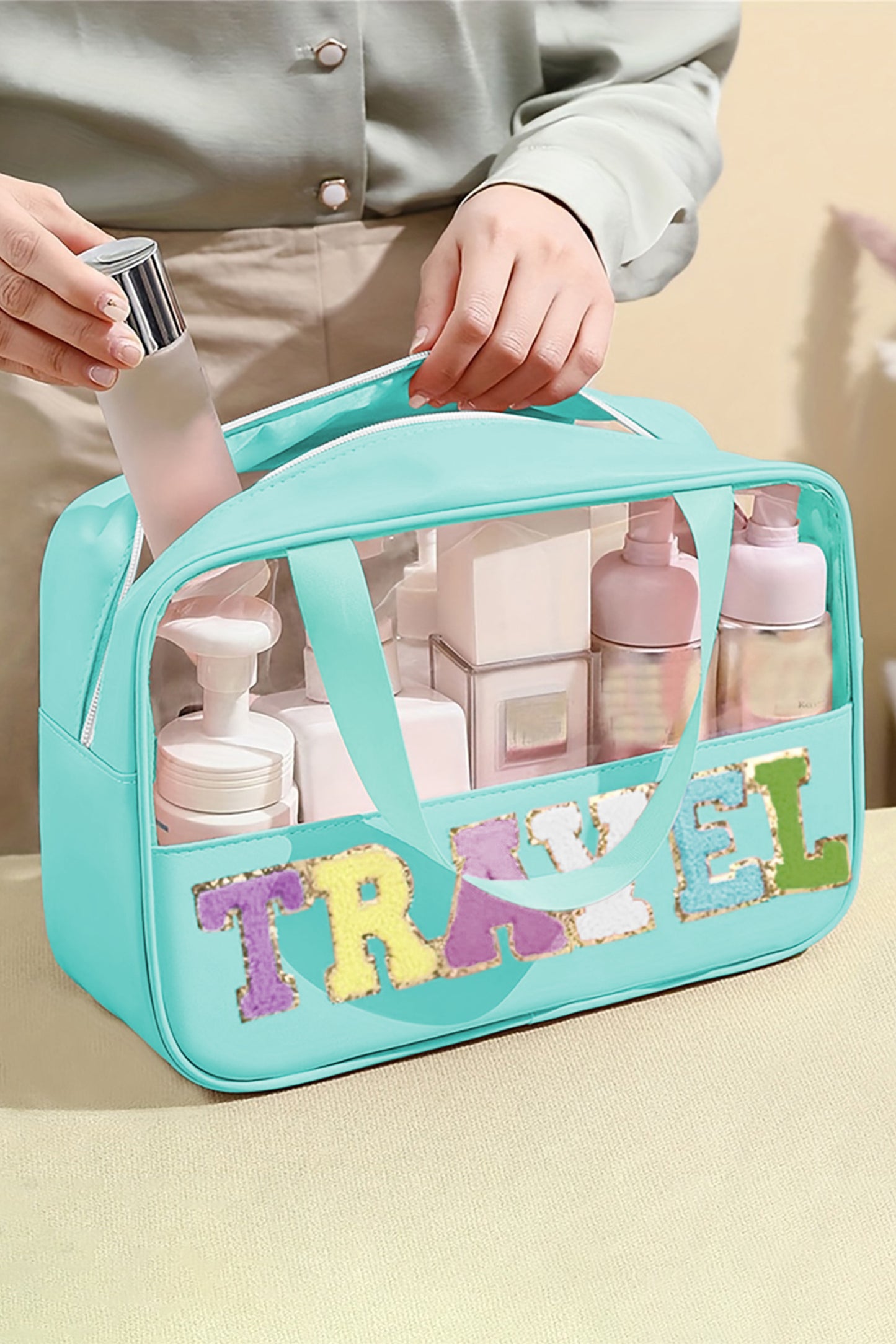 Mintgrüne Kosmetiktasche „TRAVEL“ aus Chenille mit Buchstaben, transparent, PVC
