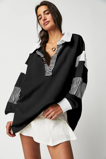 Schwarzes Sweatshirt mit gestreiftem Colorblock-Patchwork-Kragen