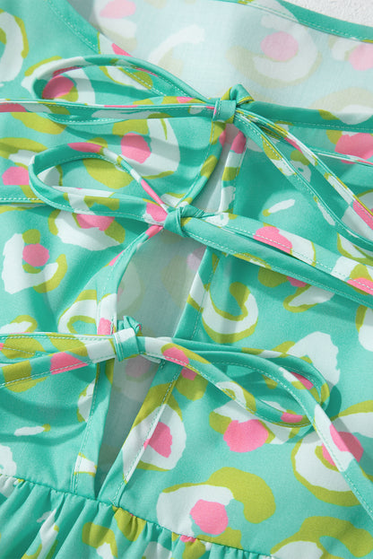 Grüne Babydoll-Bluse mit abstraktem Print und Schnürung und Laternenärmeln