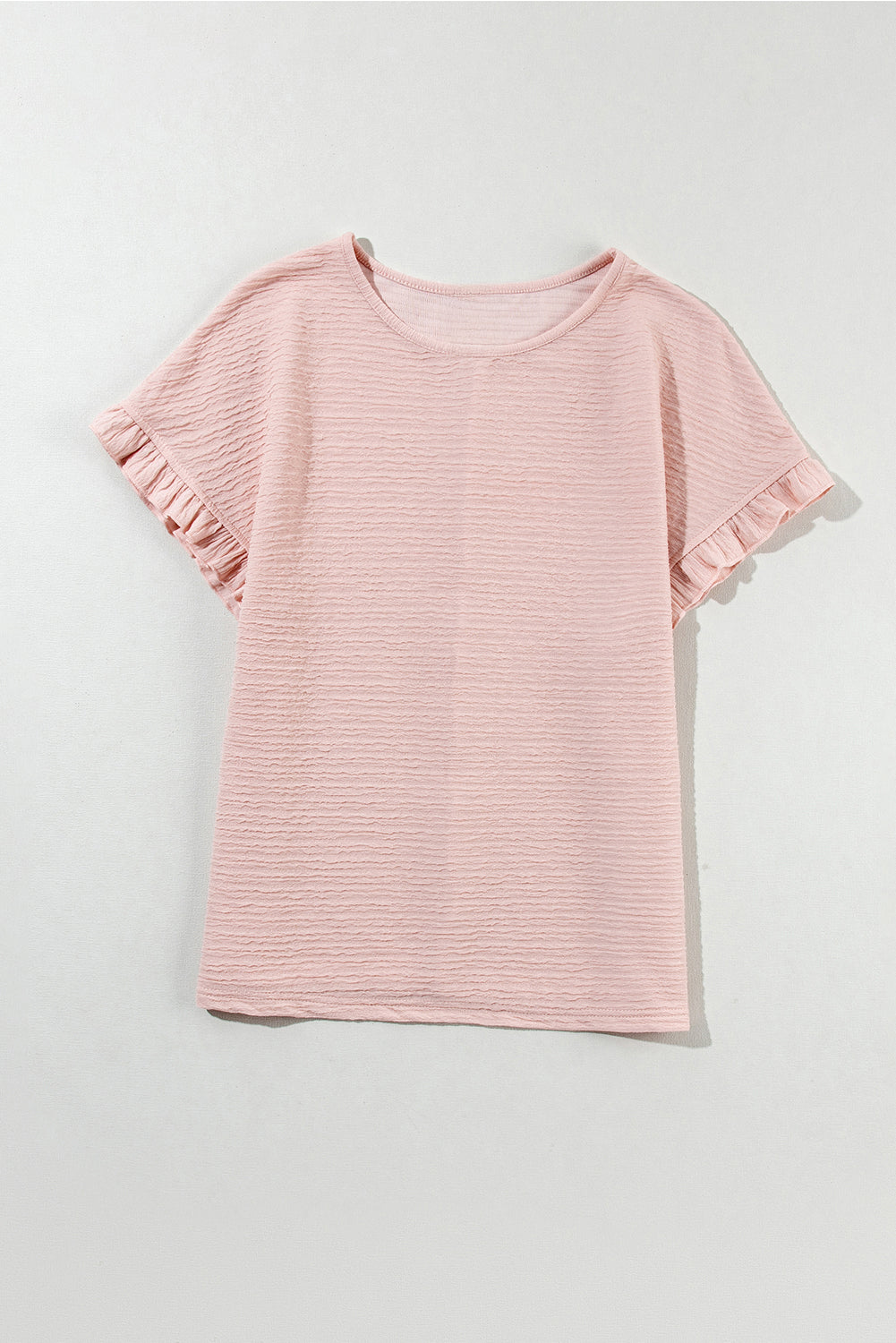 Hellrosa Bluse mit Rüschen und einfarbiger Struktur