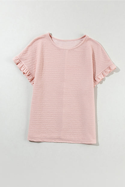 Hellrosa Bluse mit Rüschen und einfarbiger Struktur