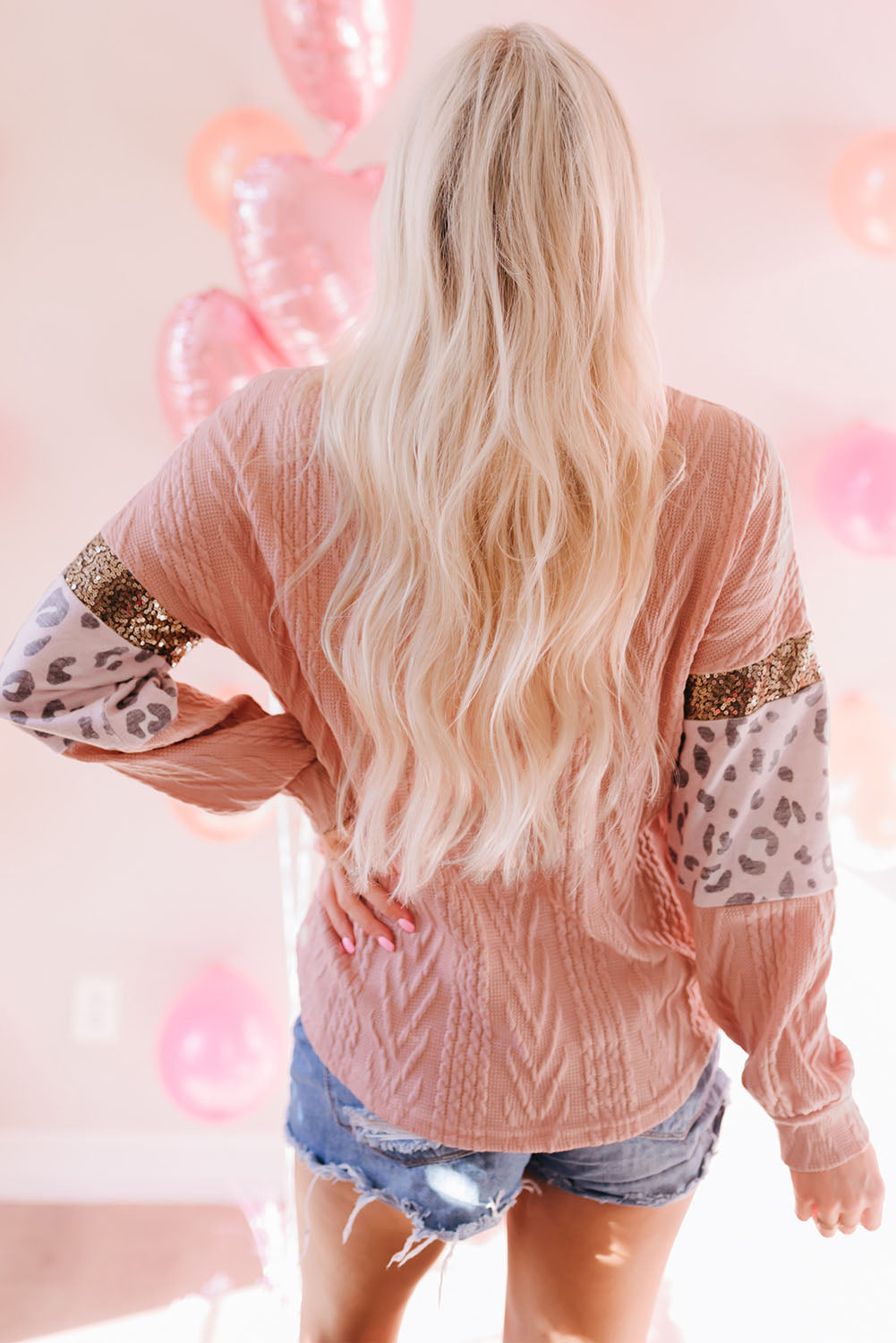 Rosa Strickoberteil mit Leopardenmuster und Pailletten