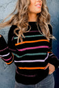 Schwarzer Pullover mit bunten Streifen und Rippenbesatz