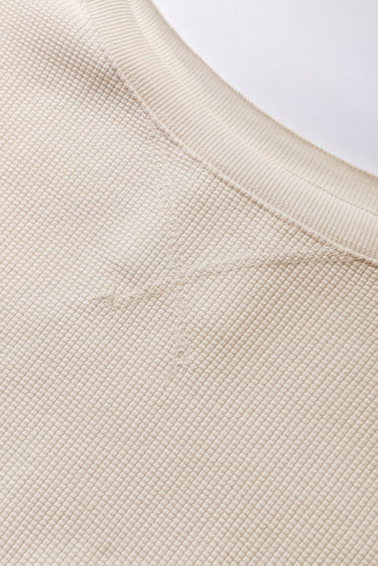 Weißes Oversize-Sweatshirt mit Waffelstrick und Bischofsärmeln
