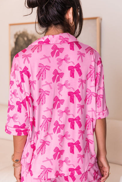 Rosa Pyjama-Set mit halblangen Hemden und Shorts mit Schleifenmuster