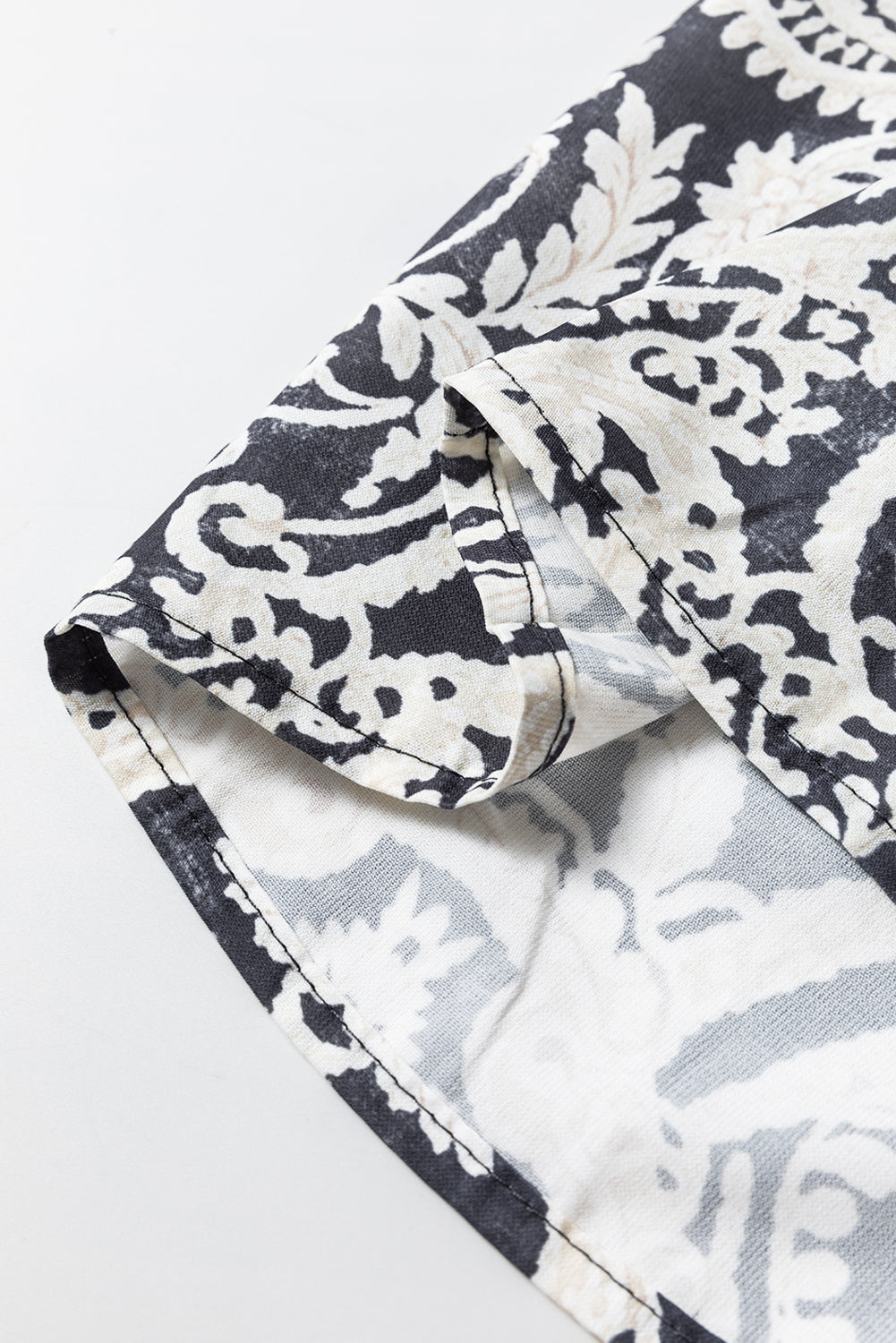 Schwarze Hose mit weitem Bein und Bohemien-Print