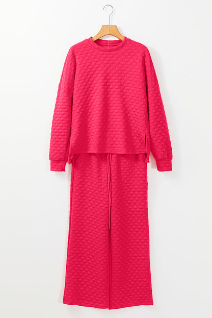 Erdbeerrosa kariertes, strukturiertes Pullover-Oberteil und Hose-Set mit Schlitz