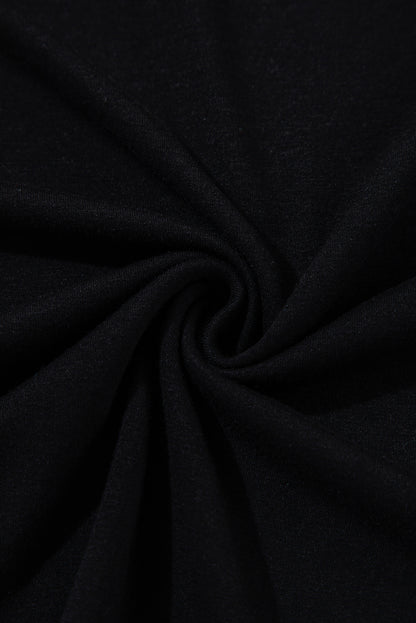 Schwarze Bluse mit transparenter Spitze und Stehkragen und langen Ärmeln