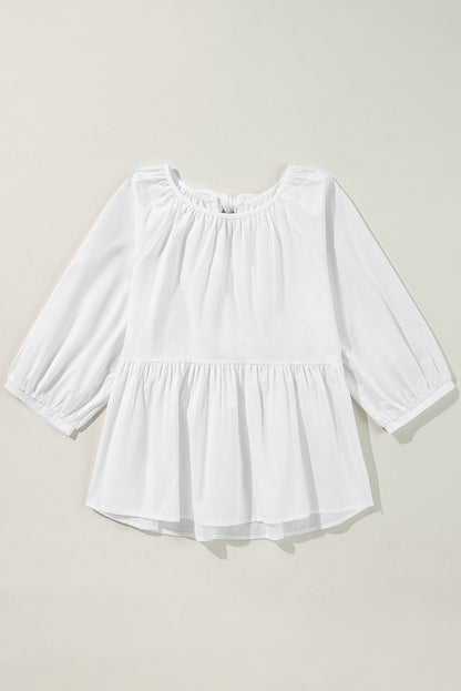Weiße Bluse mit 3/4-Ärmeln und Schleife und Cut-Out auf der Rückseite
