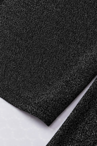 Schwarzes, schmal geschnittenes Strickoberteil mit Gigot-Ärmeln in Metallic-Optik