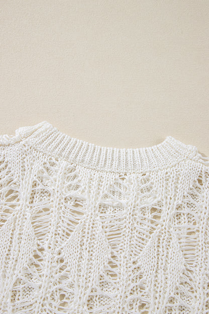 Weißer, locker sitzender Pullover mit Rundhalsausschnitt und Häkelmuster