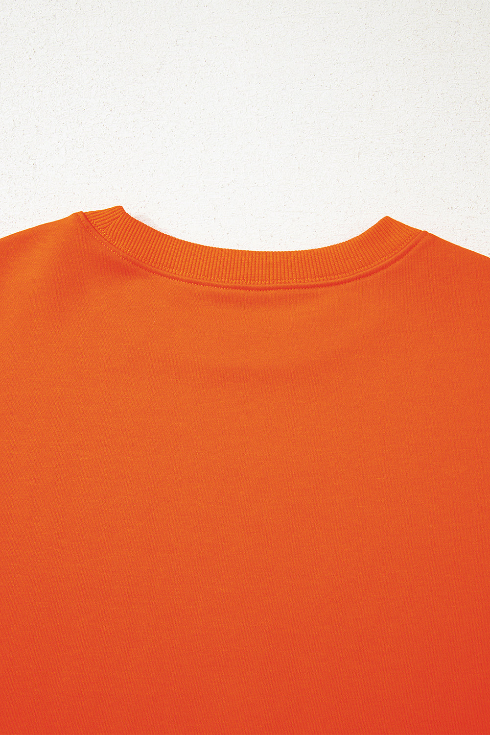 Orangefarbenes Oversize-Sweatshirt mit College-Streifen und überschnittener Schulter