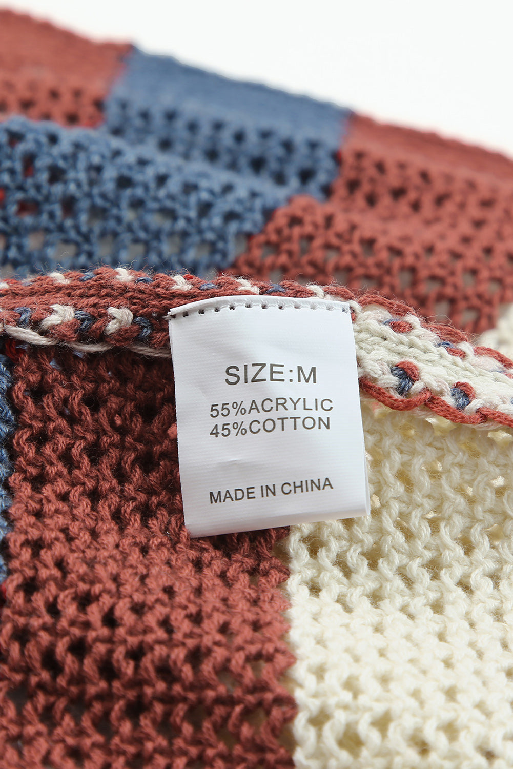 Blau gestreifte Strickjacke mit Farbblockdesign