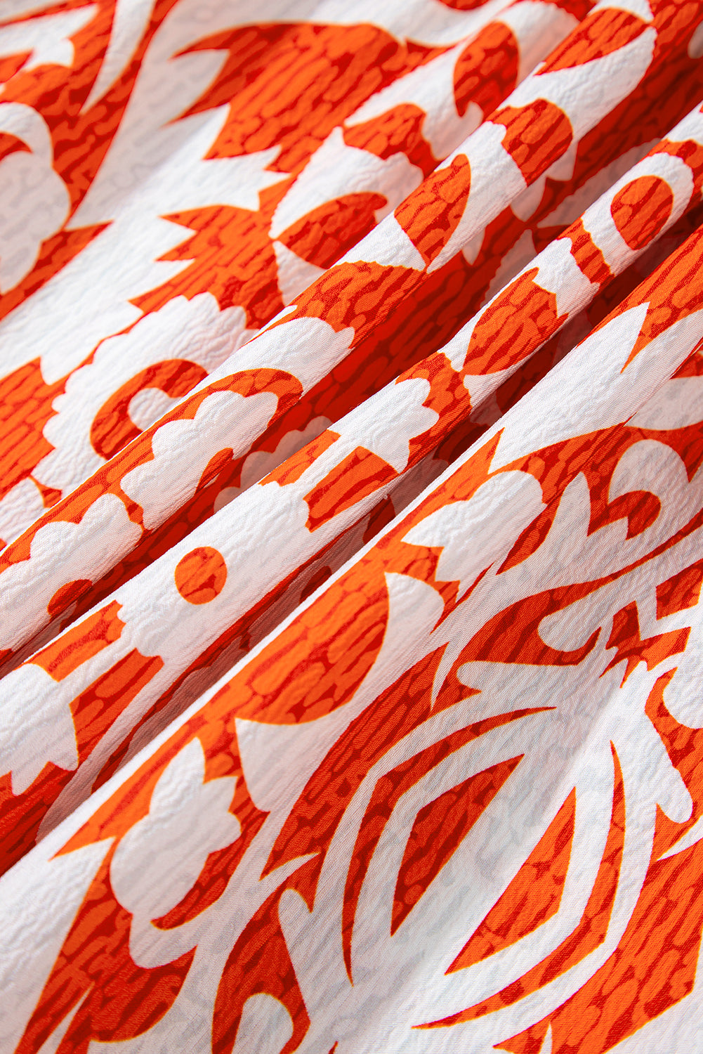 Oranges Boho-Maxikleid mit geometrischem Print und langen Ärmeln