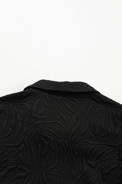 Schwarzes, strukturiertes Jacquard-Minikleid mit Viertelreißverschluss