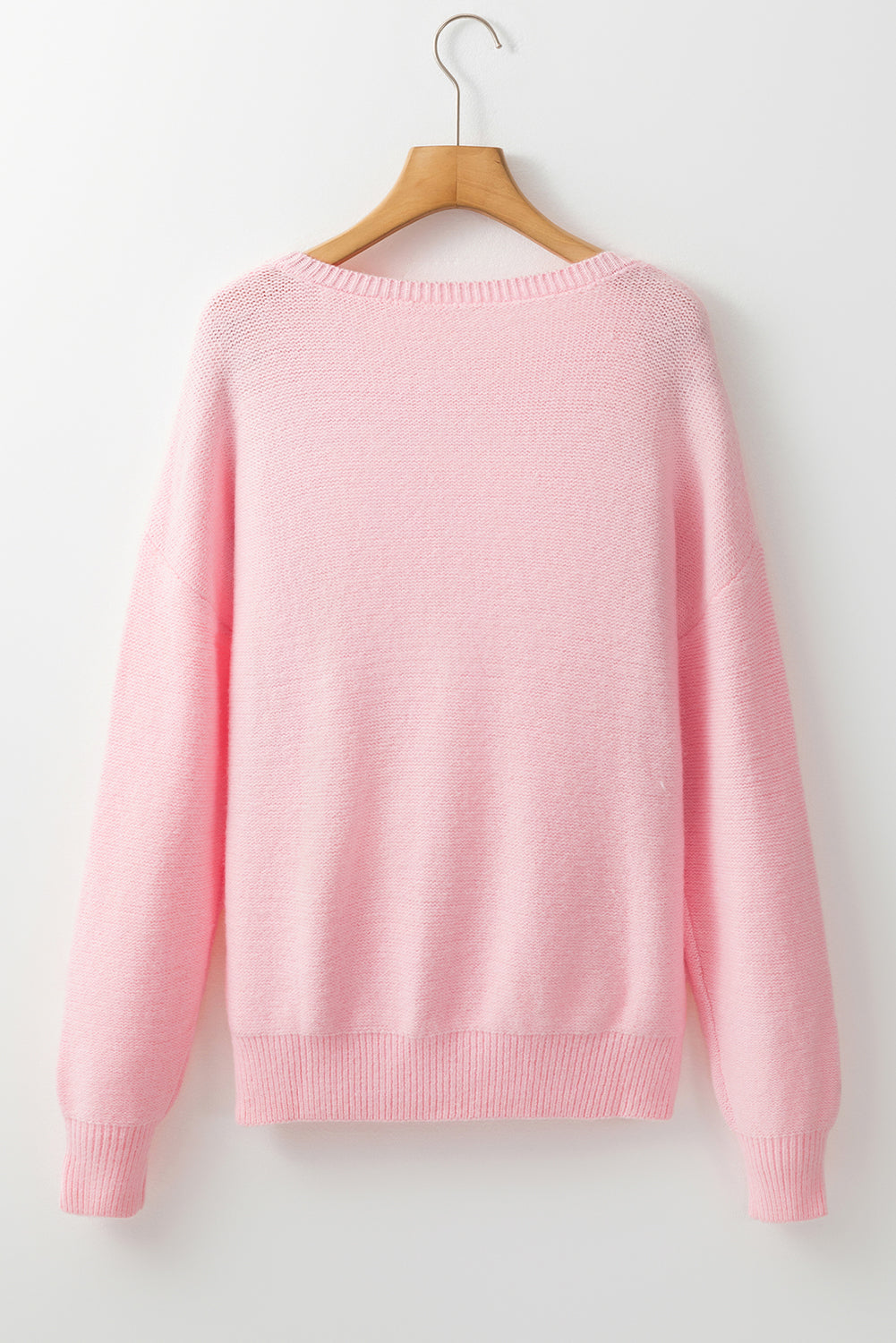 Rosa Strickpullover mit Blumenmuster und geripptem Rand