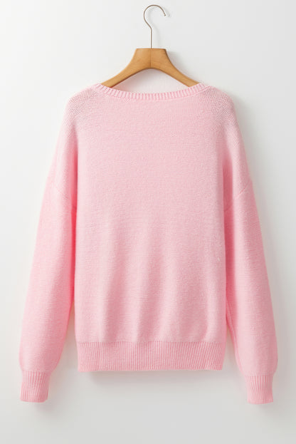 Rosa Strickpullover mit Blumenmuster und geripptem Rand