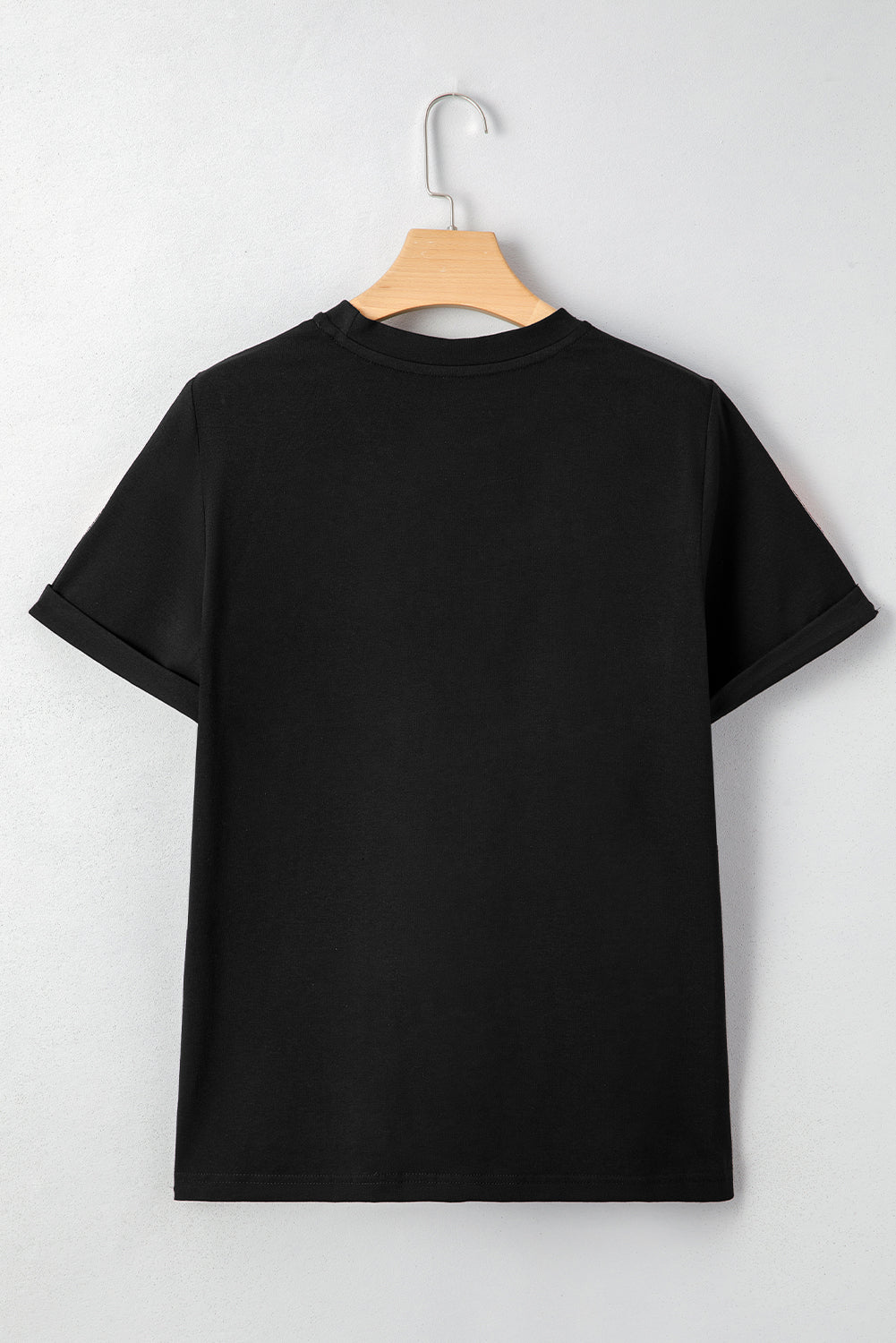 Schwarzes Pailletten-Kürbisgesicht-Halloween-T-Shirt