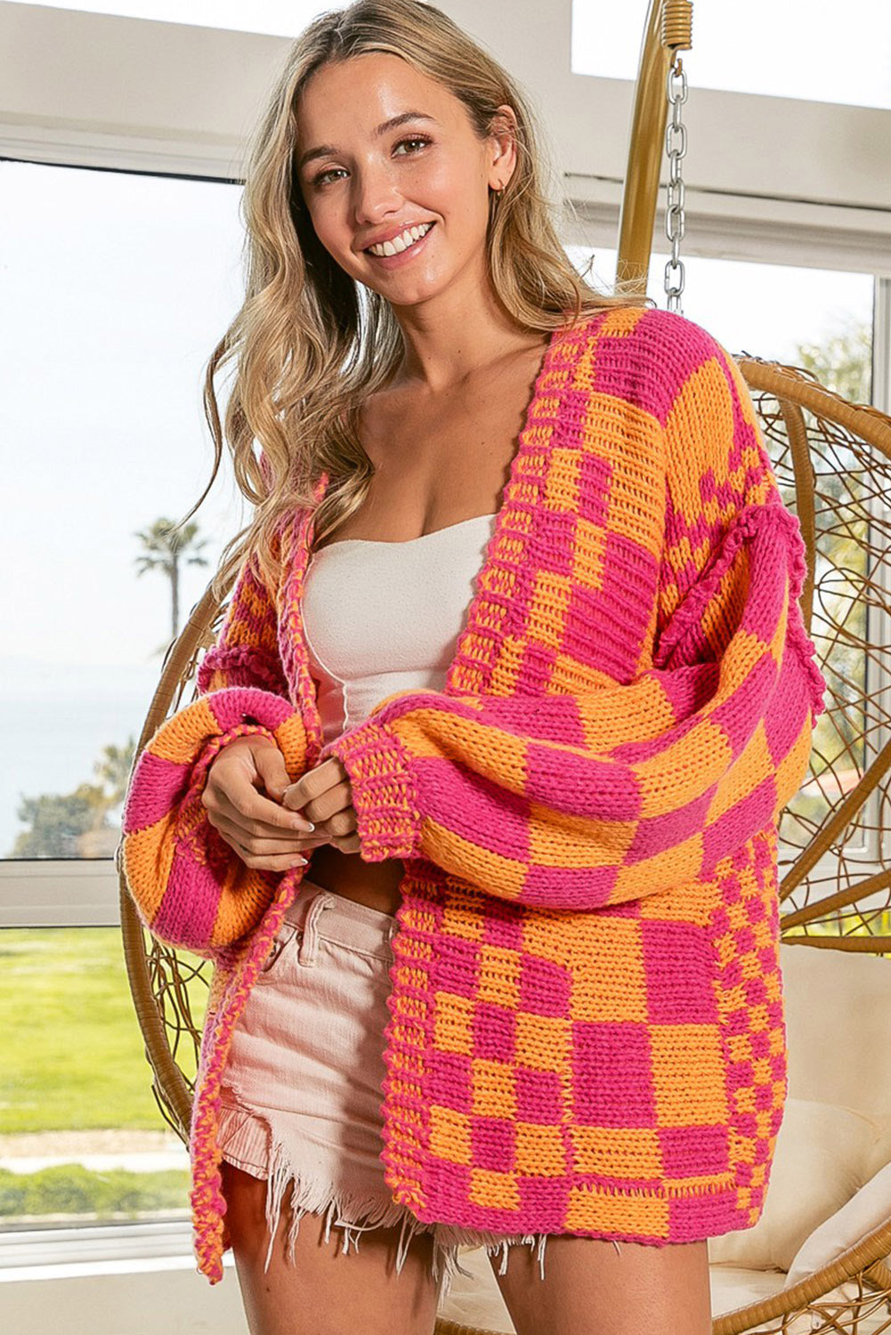 Mehrfarbige Strickjacke mit offenem Vorderteil und gemischtem Karomuster